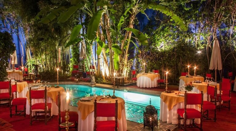 Dar Moha restaurant in Marrakech with pool courtyard and elegant Moroccan dining setting