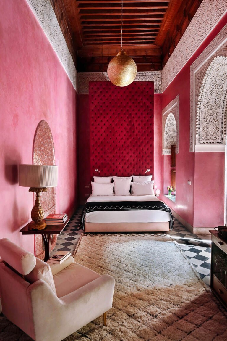 El Fenn Marrakech colorful rooftop terrace with pool and sun loungers