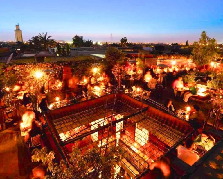 Le Foundouk Marrakech rooftop restaurant with elegant Moroccan dining in a riad setting