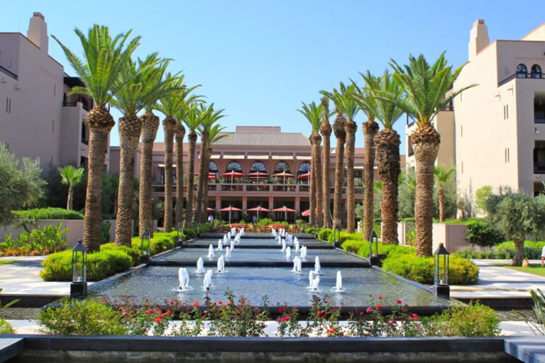 Four Seasons Resort Marrakech gardens and pool with luxury hotel setting in Hivernage