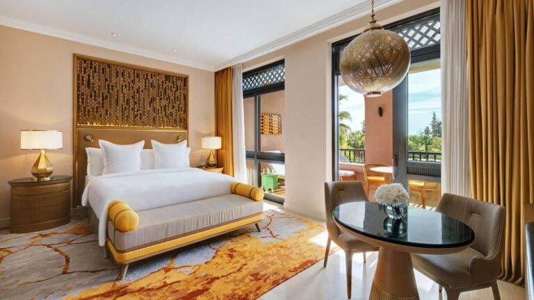 Elegant terrace room at Four Seasons Resort Marrakech overlooking lush gardens