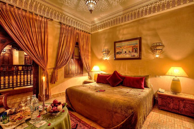 Authentic room at Riad Kniza Marrakech with handcrafted details and warm traditional tones