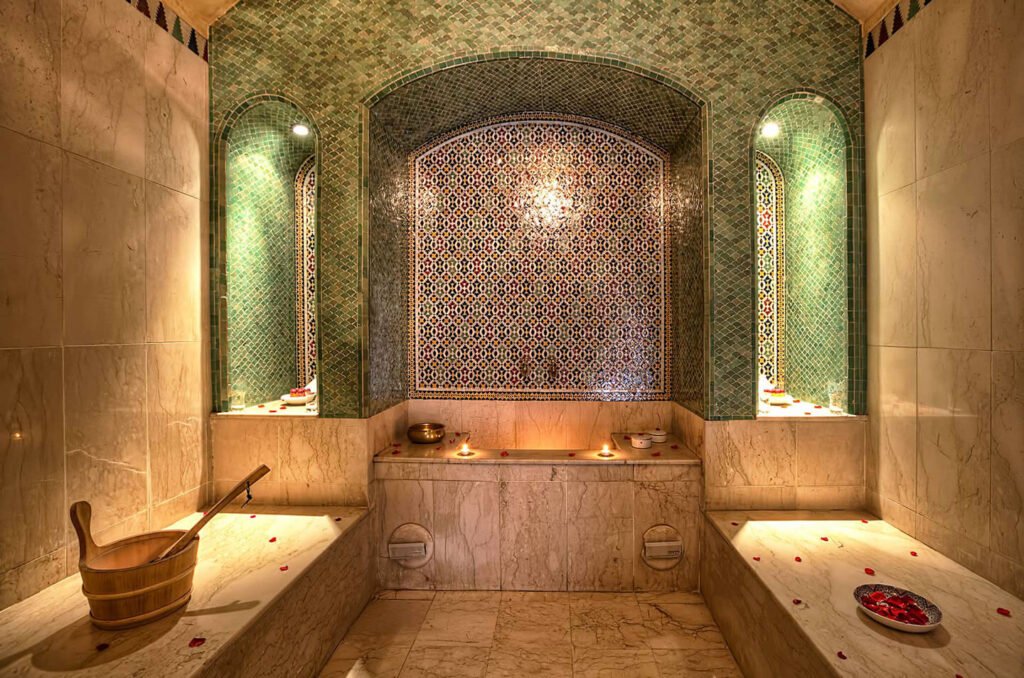 Traditional spa and hammam at Riad Kniza with Moroccan tilework and serene atmosphere