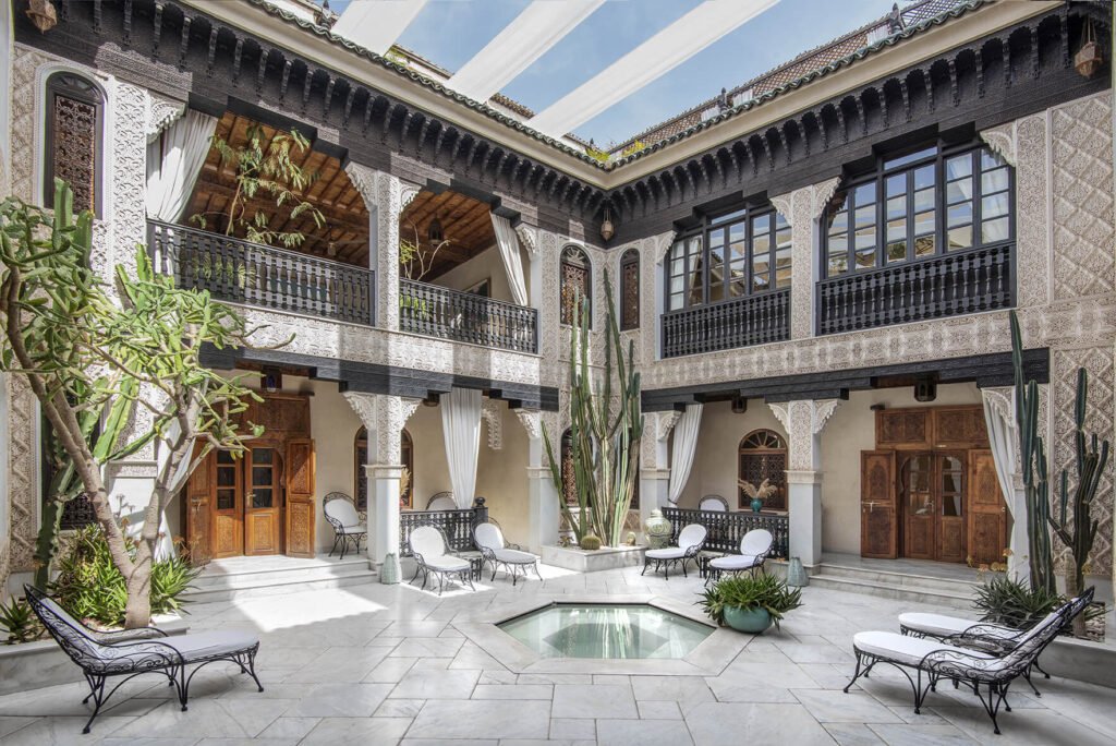 Peaceful courtyard at La Sultana Marrakech with fountain and traditional Moroccan arches