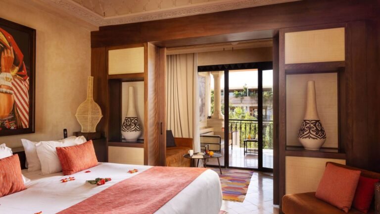 Elegant suite at Les Jardins de La Koutoubia featuring traditional Moroccan decor and warm tones