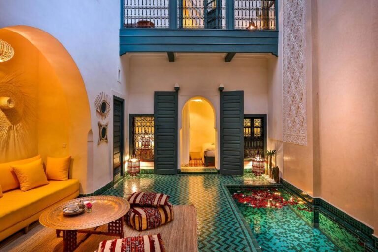 Riad Dar Baraka courtyard with traditional Moroccan decor, plants, and a calm relaxing ambiance in Marrakech Medina