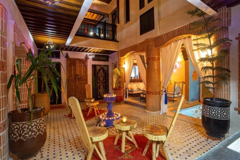 Riad Christina rooftop terrace and courtyard with Moroccan décor and budget-friendly rooms in Marrakech Medina