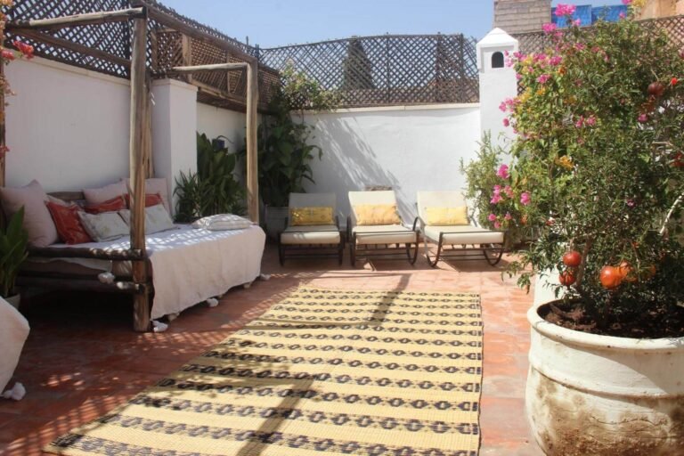 Riad Dar Nael courtyard with traditional Moroccan decor and cozy budget rooms in Marrakech Medina