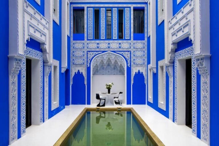 Riad Goloboy Marrakech serene courtyard with pool and Moroccan decorative tiles
