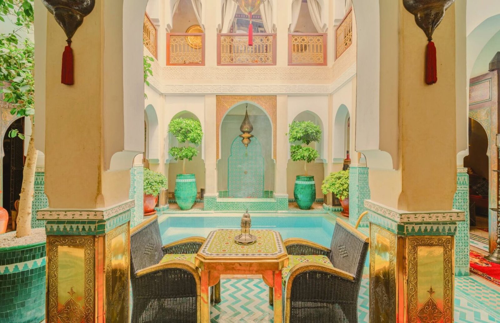 Riad Hikaya Marrakech serene courtyard with pool and elegant modern Moroccan design