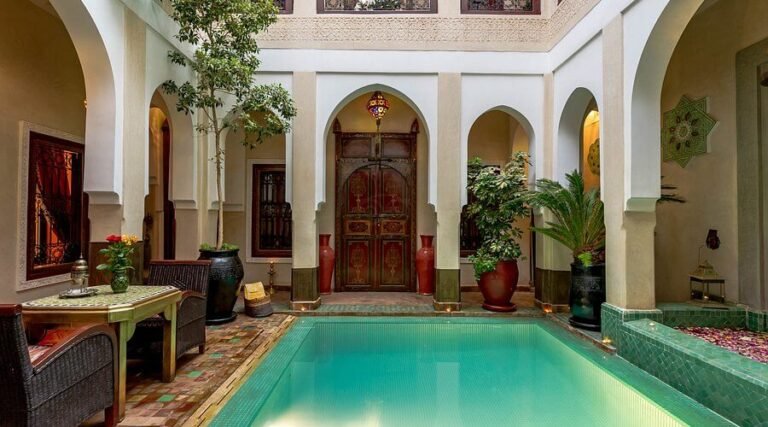Riad Hikaya Marrakech serene courtyard with pool and elegant modern Moroccan design