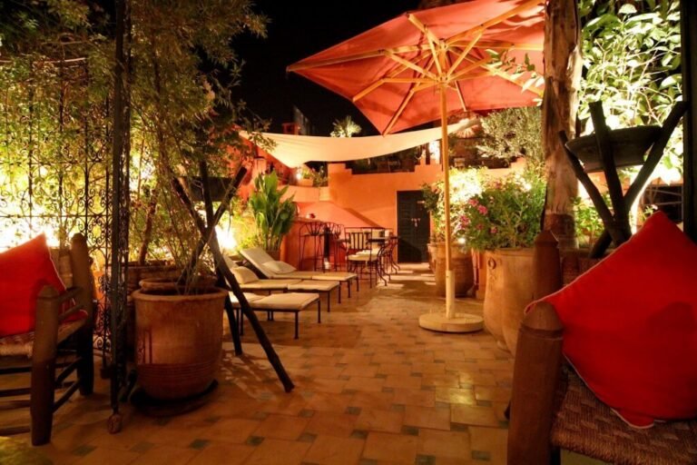 Riad Jona courtyard with Moroccan decor and simple budget-friendly rooms in Marrakech Medina