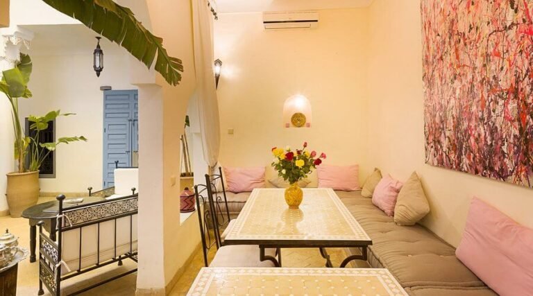 Riad Linda rooftop terrace with Moroccan decor and cozy budget‑friendly rooms in Marrakech Medina