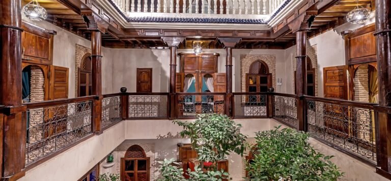 Maïpa Boutique Riad rooftop terrace with Moroccan decor and a serene courtyard in the Medina of Marrakech