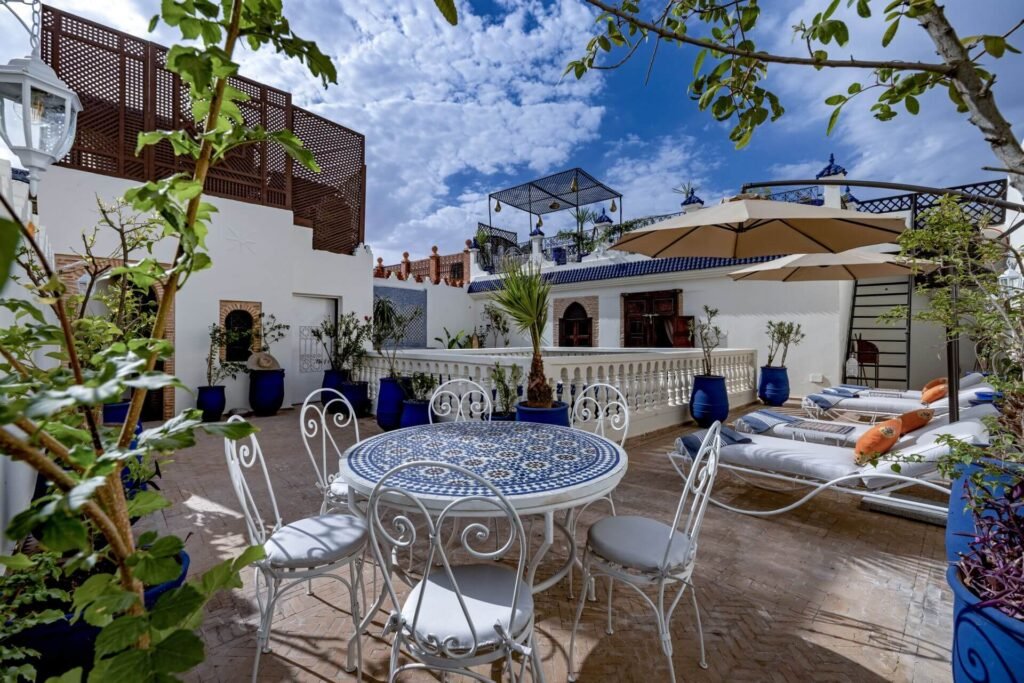 Peaceful rooftop terrace at Maipa Boutique Riad with stylish lounge seating