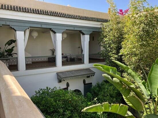 Riad Mena & Beyond Marrakech peaceful courtyard with pool and traditional Moroccan tiles