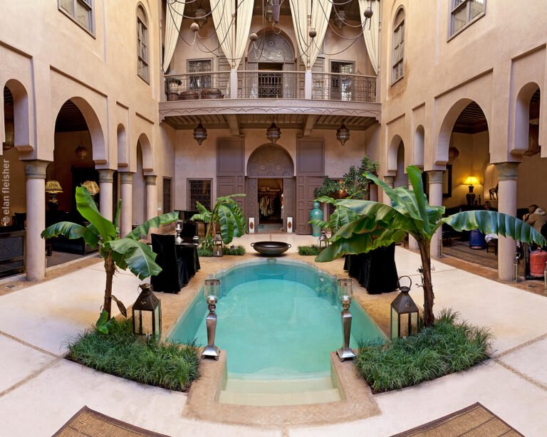 Riad Noir d’Ivoire Marrakech luxurious courtyard with pool and elegant Moroccan decor