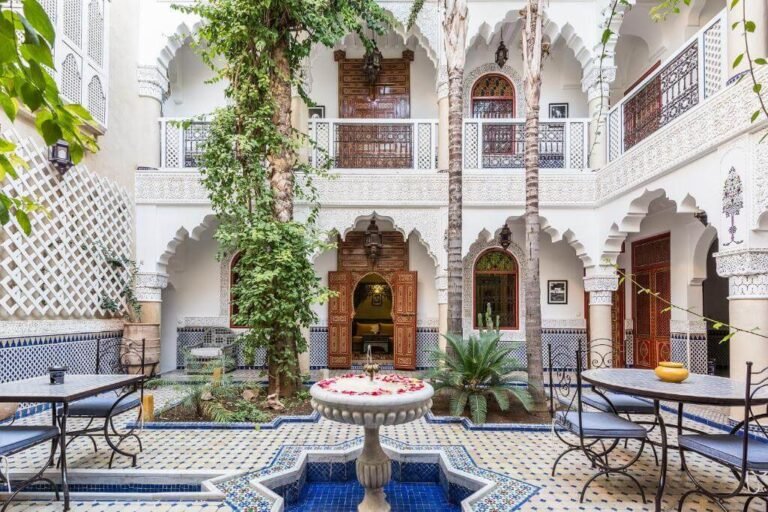 Peaceful courtyard at Riad Tahyra with classic Moroccan architecture and warm ambiance