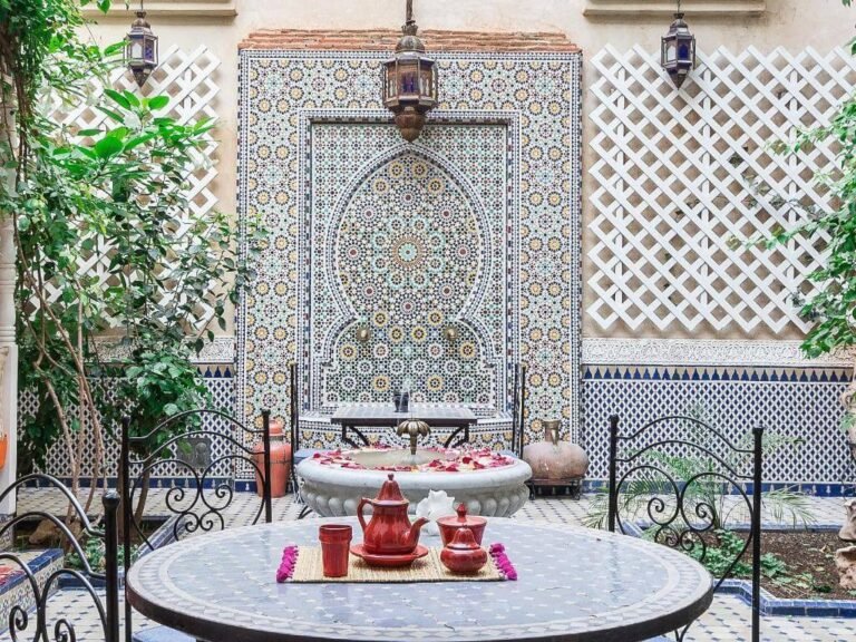 Traditional zellige patio at Riad Tahyra with authentic Moroccan tilework and peaceful atmosphere