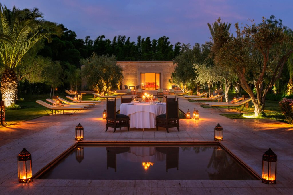 Riad Terra Ababila courtyard with traditional Moroccan decor, plants, and a calm relaxing ambiance in Marrakech Medina