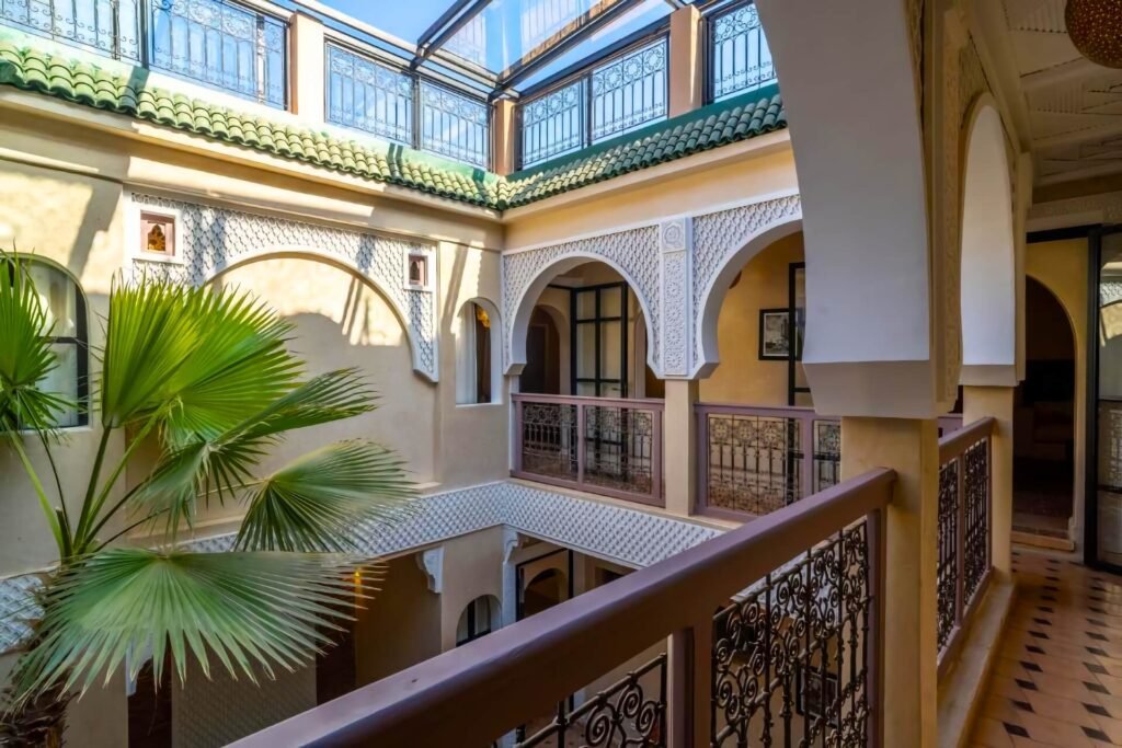 First-floor balcony at Riad Beldi overlooking the peaceful central patio