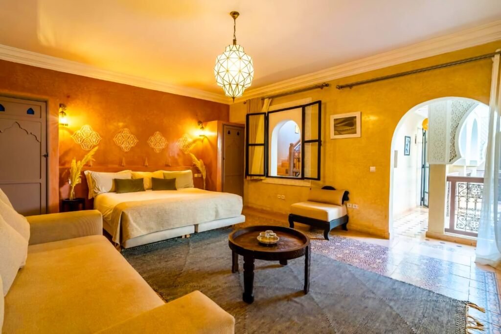 Cozy room at Riad Beldi with authentic Moroccan decor and warm boutique ambiance