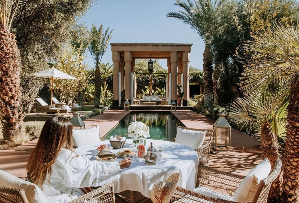 Fine dining experience at Selman Marrakech with warm lighting and elegant setting